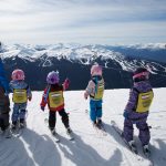 Whistler Kids with Inukshuk in background
